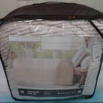 bézs pléd, meleg takaró táskában